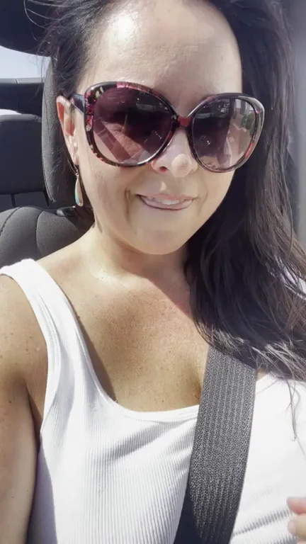 Traffic Jam Tease: Mature Hottie's Sunglass Seduction