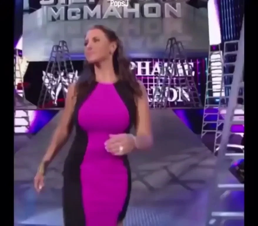 Stephanie McMahon’s Massive Tits Strut in Tight Pink Dress 🔥🍈🍈