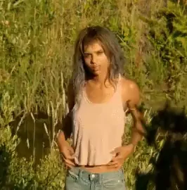 Zoe Kravitz's Sultry Field Tease 😈🌾🍑