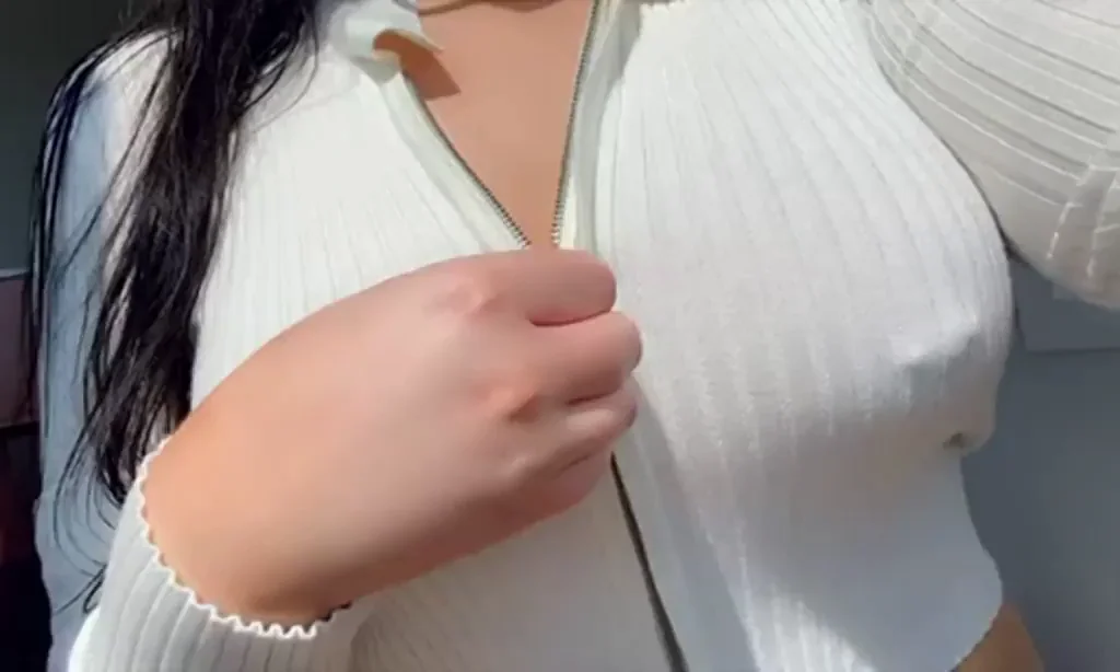 Zipper Tease: Massive Pierced Tits Burst Out to Brighten Your Day
