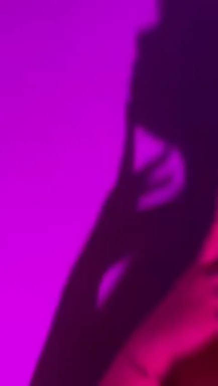Shadow Kiss Seduction: Latina Curves in Purple Haze