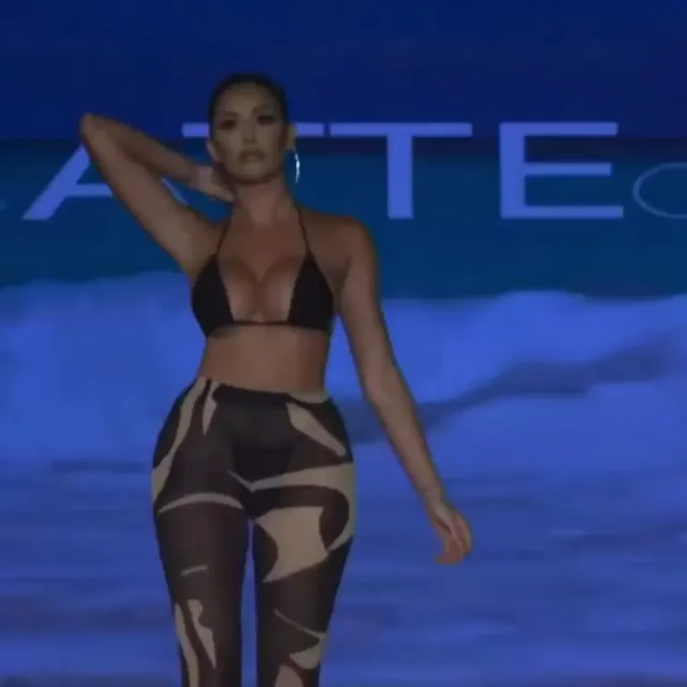 Curvy Bombshell Teases with Massive Tits and Juicy Ass on Runway