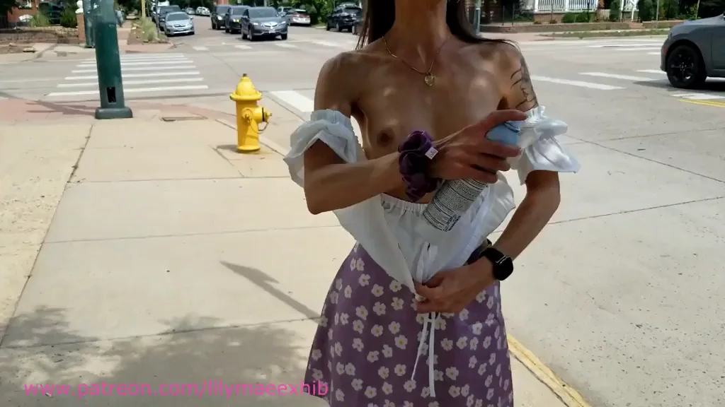 Better spray down my tits...they're going to get a lot of sun flashing them around town!