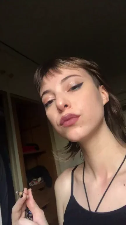 Stoner Babe's Sultry Smoke Tease: Taste My Juicy Lips?