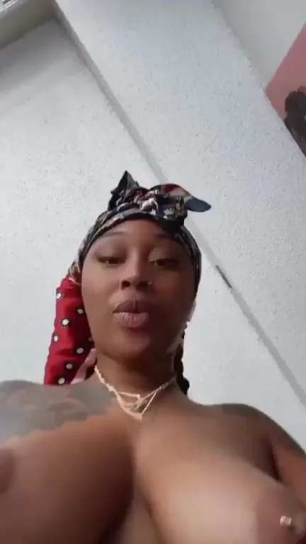 Thick Ebony Babe Teases with Massive Tits