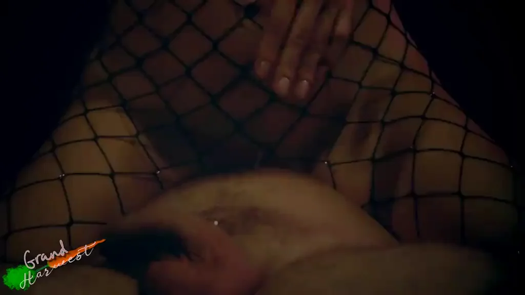 Woman in fishnets warms him up