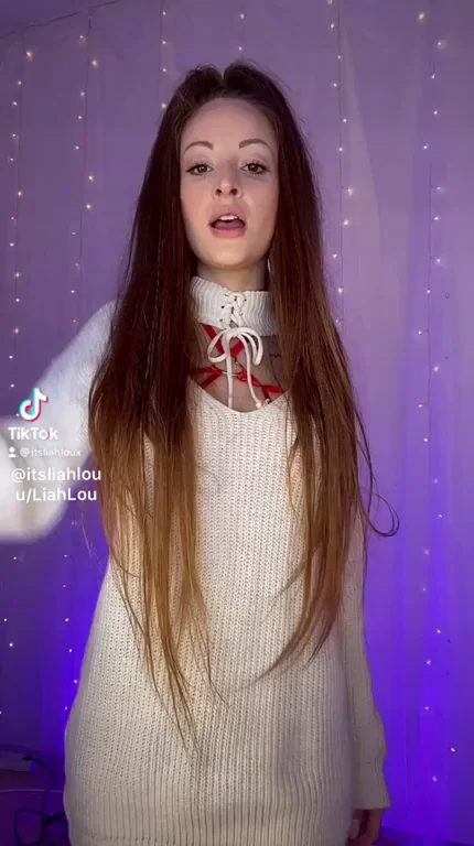 🔥 Redhead TikTok Slut Serves Snack Tease in Sweater & Red Harness 😈