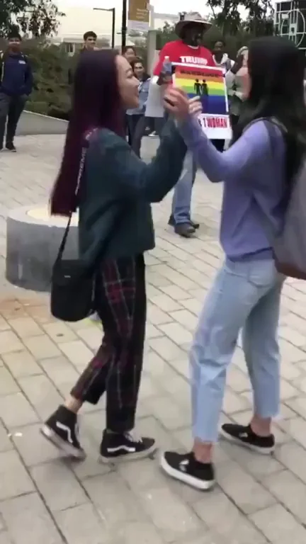 Two cuties give an old Tom a show