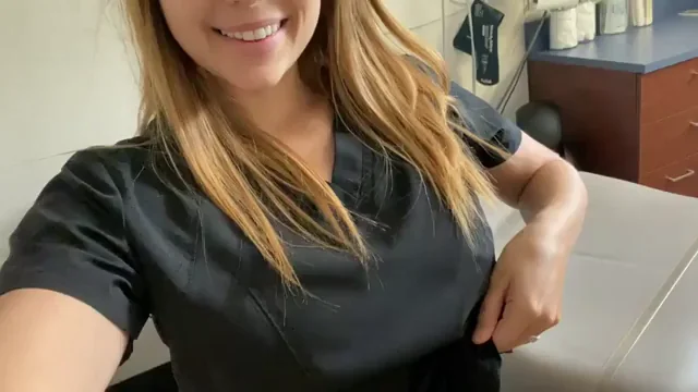 Naughty Nurse Teasing in Tight Scrubs