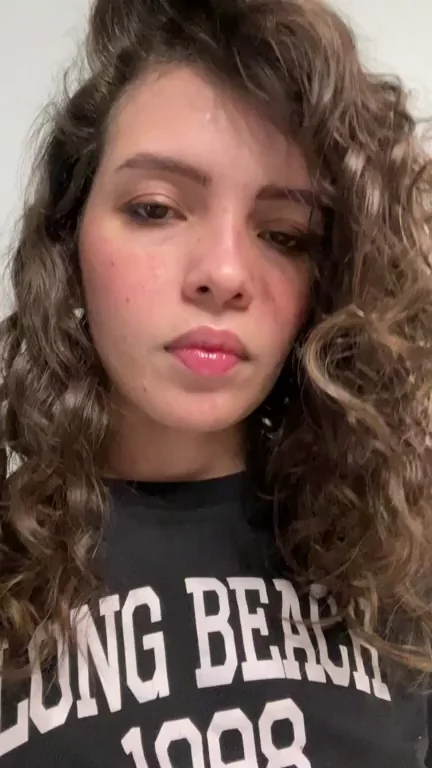 Love how my curly hair compliments my face plus the underboob.