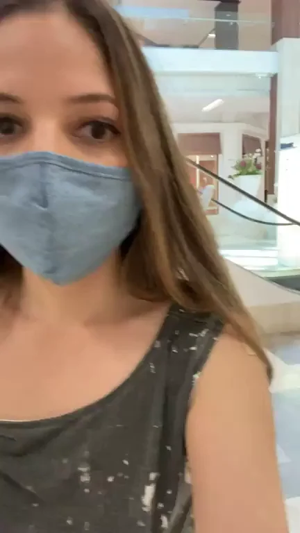 Giving you a quick tit flash at the mall