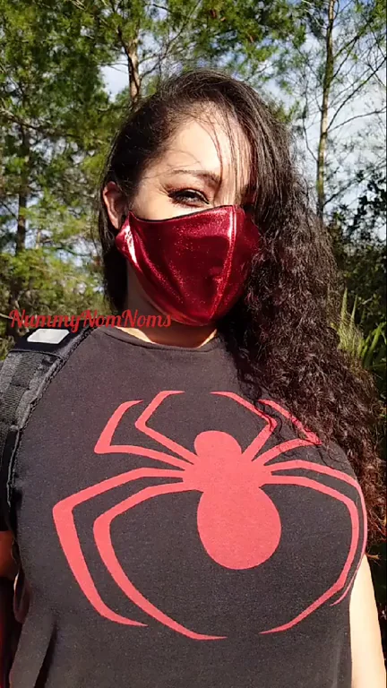 Shiny Masked Spider Slut Teases Her Massive Tits Outdoors