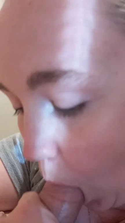 Putting on lip gloss