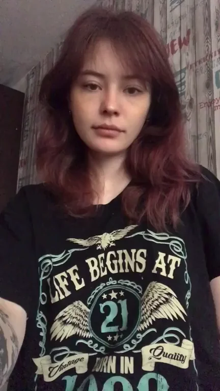 What's this Goth (me) hiding under her shirt?
