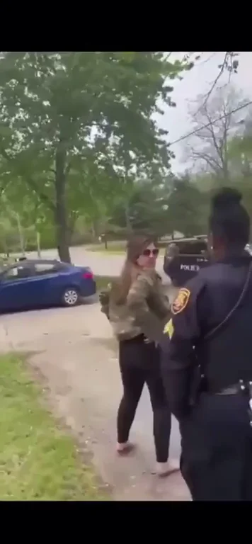 Woman flashes ass to cop