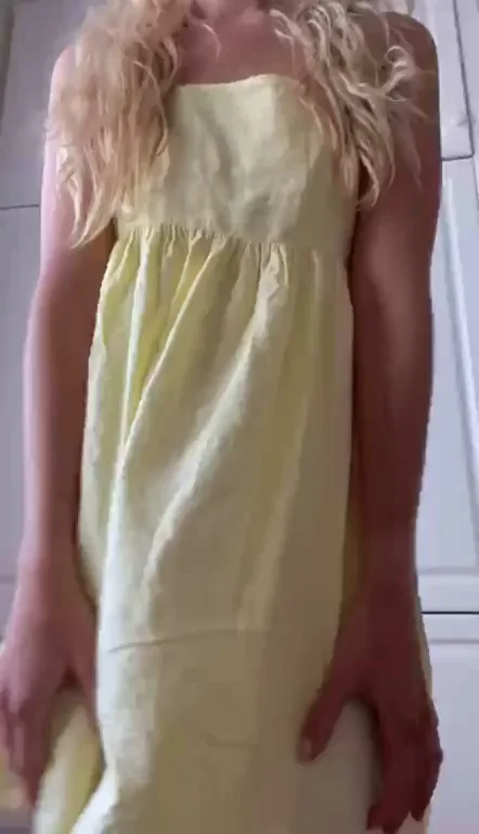Blonde Babe Lifts Dress to Flash Her Juicy Pussy