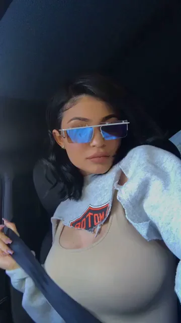Kylie Jenner's Slutty Car Tease: Massive Tits Spill Out