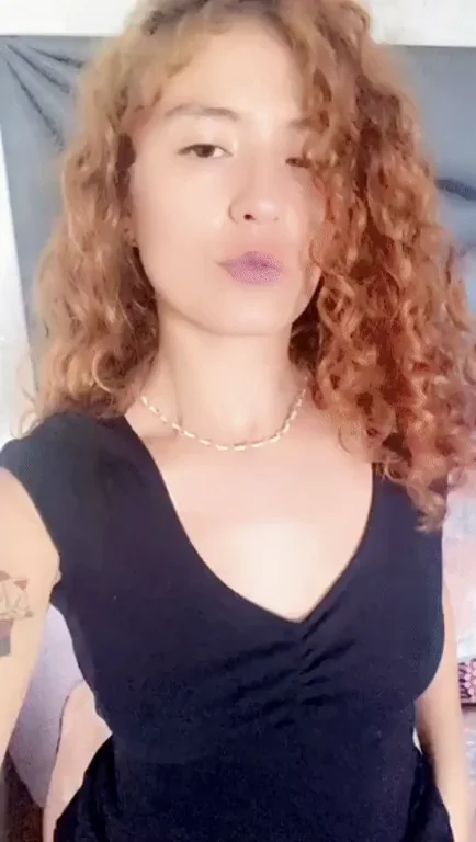 Latina Redhead Slut Stripping Her Big Tits for You