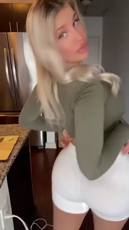Thick Blonde Bombshell's Innocent Ass Tease in White Booty Shorts