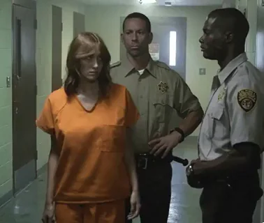 Sara Malakul Lane's 🔥 Jailbait Strip Tease in Orange Jumpsuit
