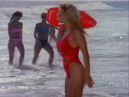 Pamela Anderson's Iconic Red Baywatch Swimsuit Tease 😍🌊🍒
