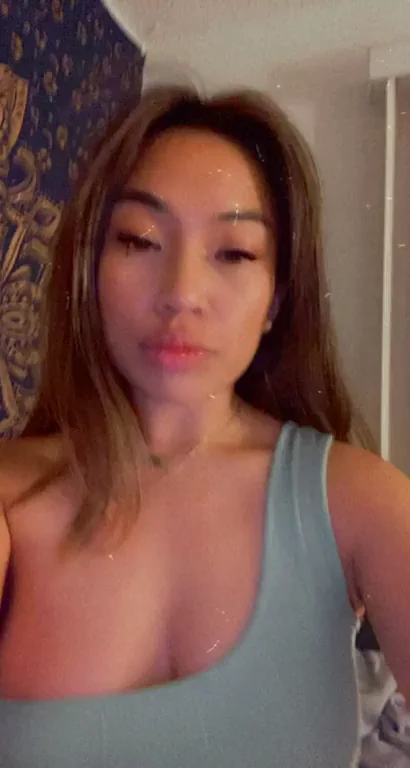 Asian Babe's Teasing Ass Wiggle in Tight Dress