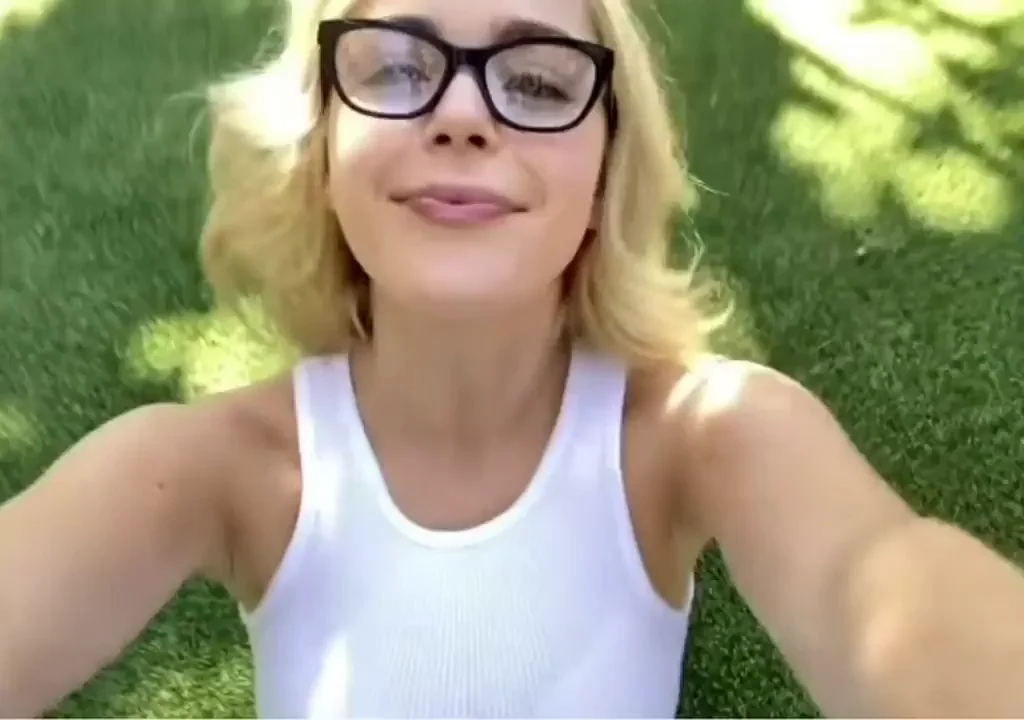 Kiernan Shipka laying down on her back for us