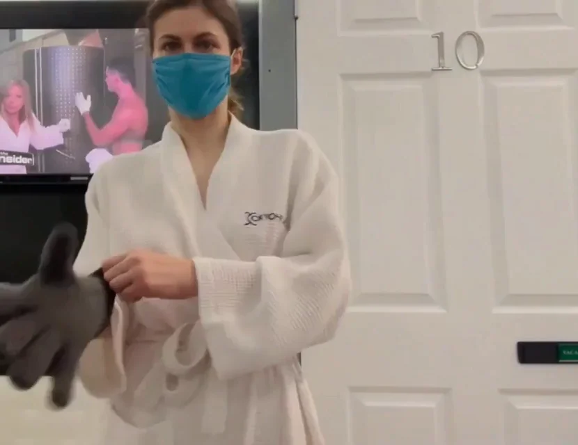 Alexandra Daddario - Braless under a robe