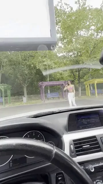Busty Babe Teases from Car: Who Wants to Film My Tits? 🔥🍑