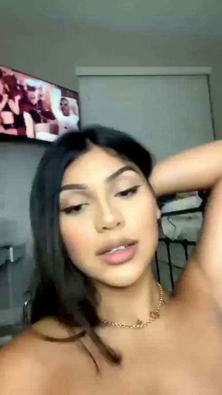 Asian Hottie Teases Massive Melons: Suck These Juicy Tits?