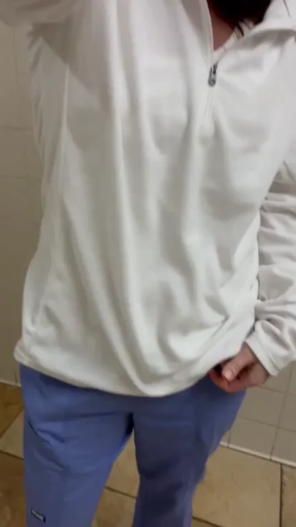 Naughty Nurse's Matching Lingerie Tease Under Scrubs