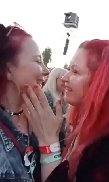 Redhead MILF Lesbians Tease and Giggle at Festival