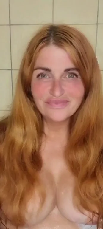 I love playing with my big soft tits in the bathtub...