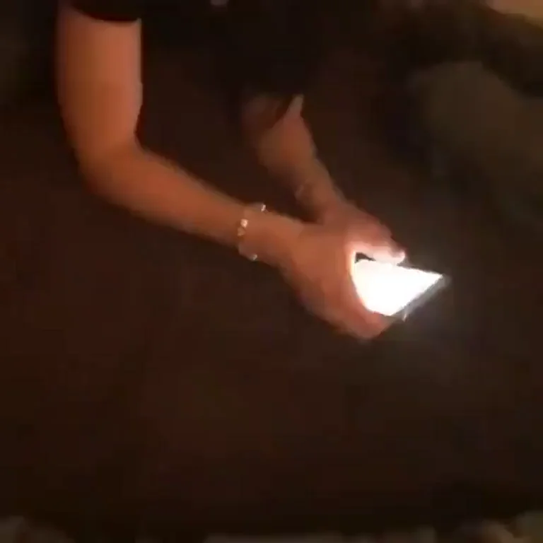 Mystery Babe Phone Tease with Hot Grin Closeup