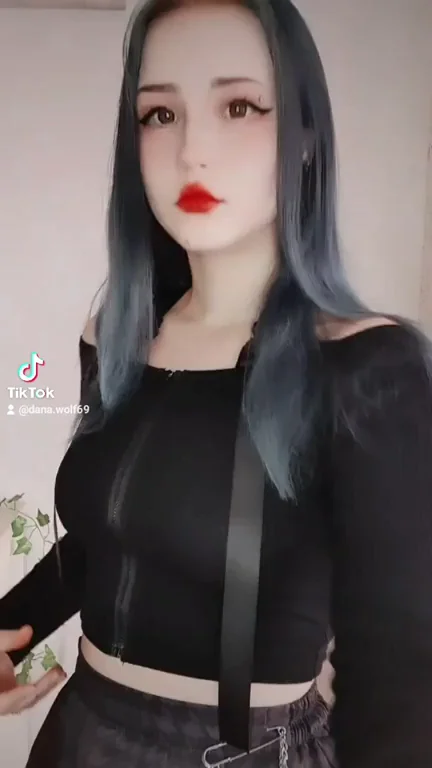 Russian TikTok Tease: Goth Babe's Skirt-Up Booty & Cleavage Flash GIF