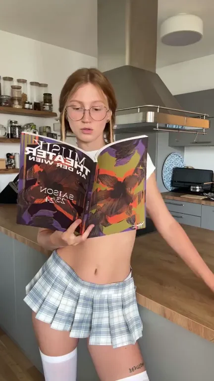 Redhead Schoolgirl's Kitchen Tease: Nerdy Slut Reads Erotica Barely Covered