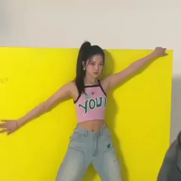 Jiheon from fromis_9 Teasing in Pink Tank and Tight Jeans
