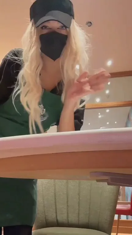 I know it's risky but could you slide in from under the table? Im sure the customers will enjoy watching