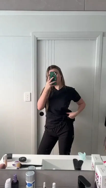 Naughty Nurse Teasing with Perky Tits in Scrubs