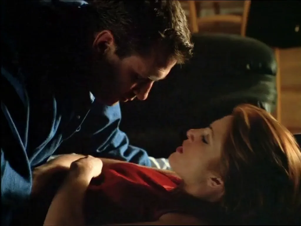 Angie Everhart's Retro Tit-Sucking Tease in Bare Witness