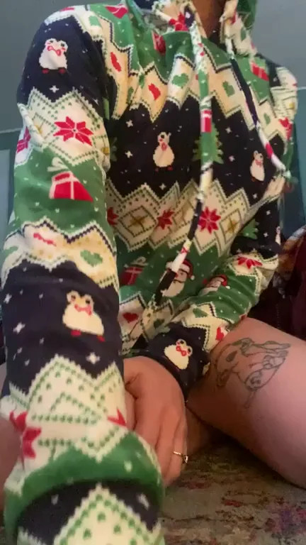Petite MILF's Christmas PJ Tease with Tattoos and Perky Tits