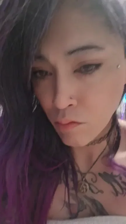Just a Teasing Peek at Inked Tits