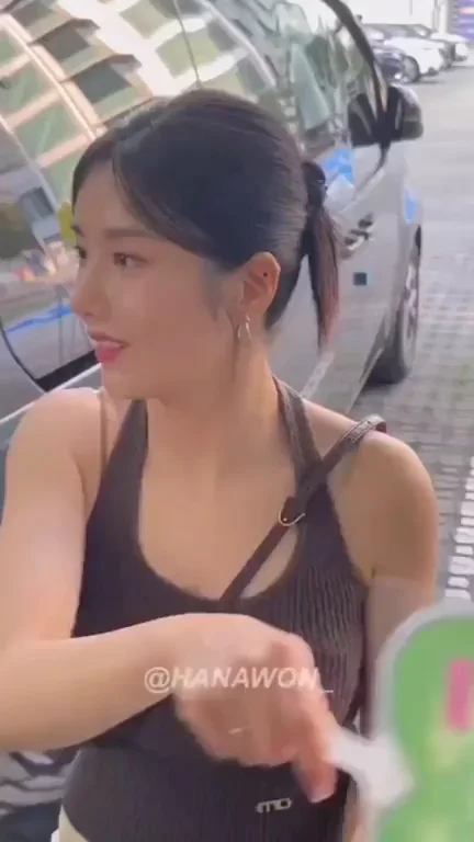 Kwon Eunbi's Tight Tank Tease in Parking Lot