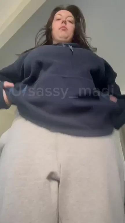 Thick BBW Tease Strips Off Hoodie for Massive Tit Flash