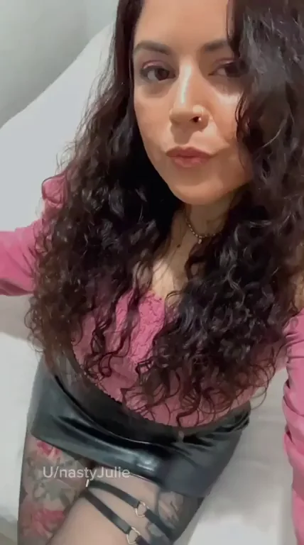 Tattooed Brunette Tease in Pink Top and Leather Skirt
