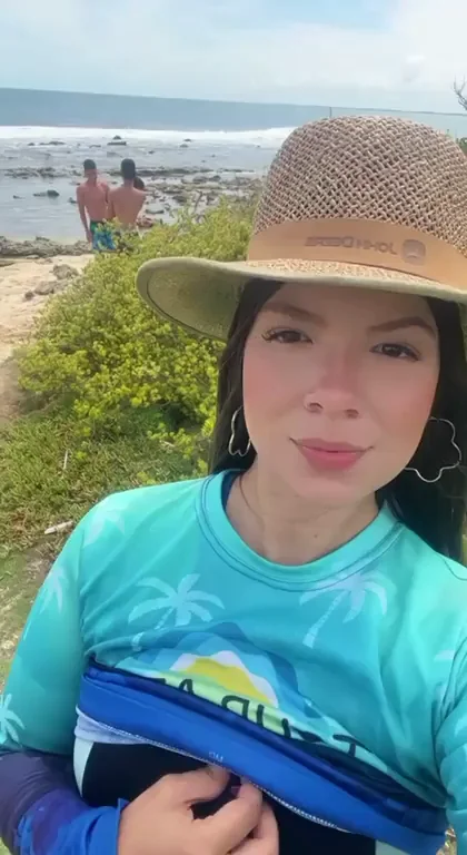 flashing at the beach with others around