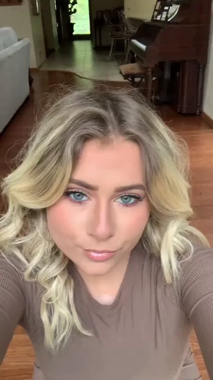 Blonde Bombshell's Tight Dress Tease