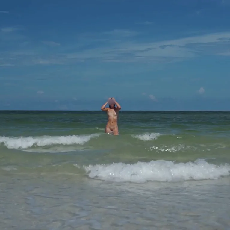 Tiny titty jiggle coming out of the ocean