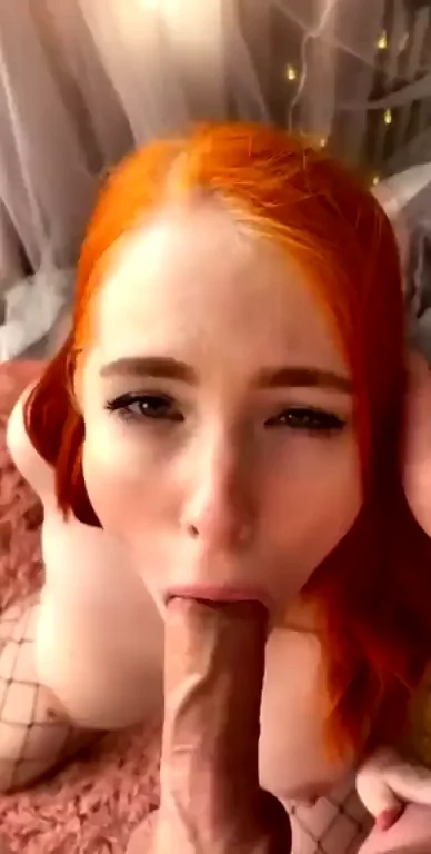 Beautiful redhead milks him