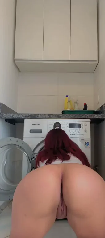 Thick Redhead Bends Over Washer for Insane Backshots